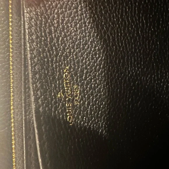 Authentic Louis Vuitton Black Zippy Wallet.
Monogram Empreinte Leather. - Picture 10 of 16
